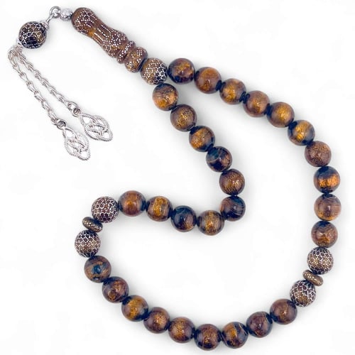 اليسر الذهبي الملكي: سبحة فاخرة بتفاصيل فضية تُعان...