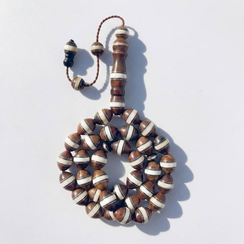 سبحة خشب الكوك وعاج الفيل الطبيعي: فخامة تلامس الر...