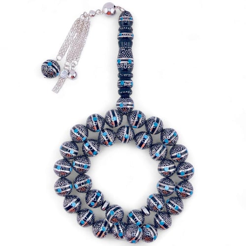 سبحة كوك و الشاهد يسر طبيعي مطعمة بالفضه ولون الفي...