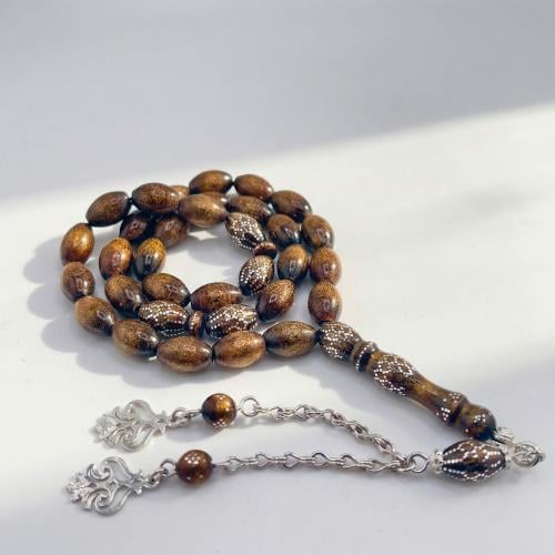 سبحة اليسر الذهبية النادرة مطعمة بالفضة - قطعة فني...