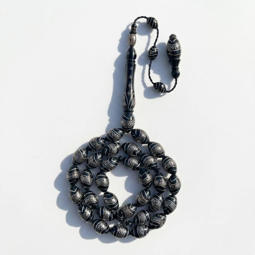 سبحة يسر مرجان اسود طبيعي مطعمة بالفضة عيار 999 -...