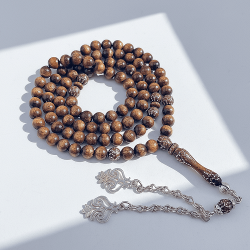 سبحة اليسر الذهبية النادرة مطعمة بالفضة 8 ملي - قط...