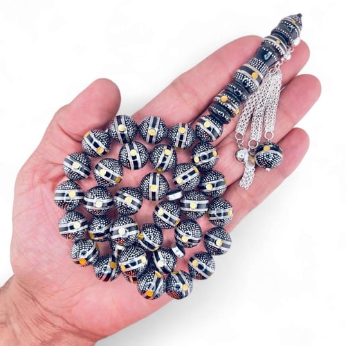 سبحة كوك و الشاهد يسر طبيعي مطعمة بالفضه ولون الكه...