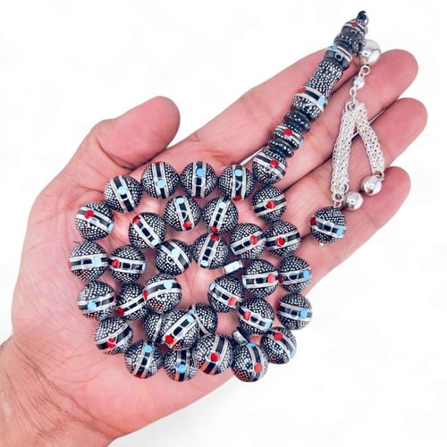 سبحة كوك و الشاهد يسر طبيعي مطعمة بالفضه ولون الفي...