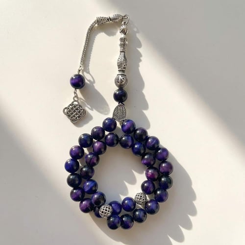 سبحة حجر عين النمر الكريم باللون البنفسجي