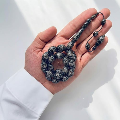 سبحة يسر مرجان اسود طبيعي مطعمة بالفضة عيار 999 -...