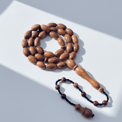 سبحة خشب كوك طبيعي - 7 ملي 33 خرزة نواعم