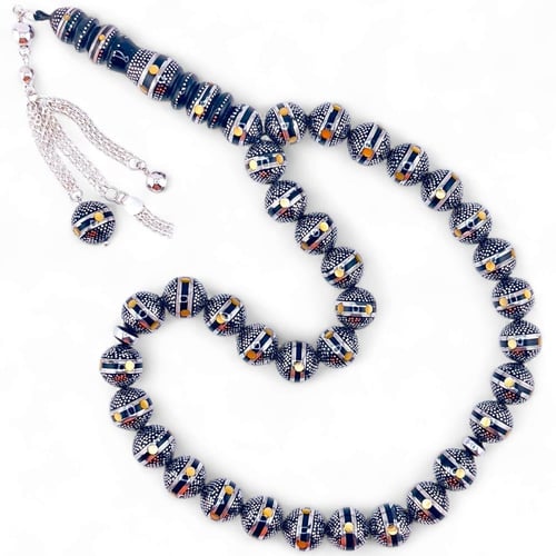 سبحة كوك و الشاهد يسر طبيعي مطعمة بالفضه ولون الكه...