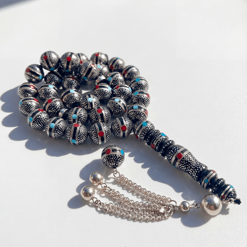 سبحة كوك و الشاهد يسر طبيعي مطعمة بالفضه ولون الفي...