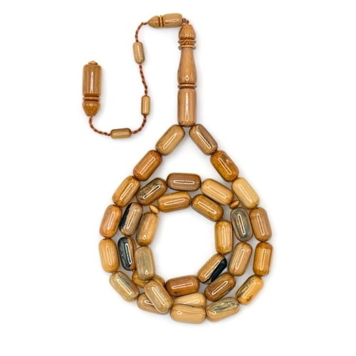 سبحة عاج ماموث المنقرض: أثر فني نادر