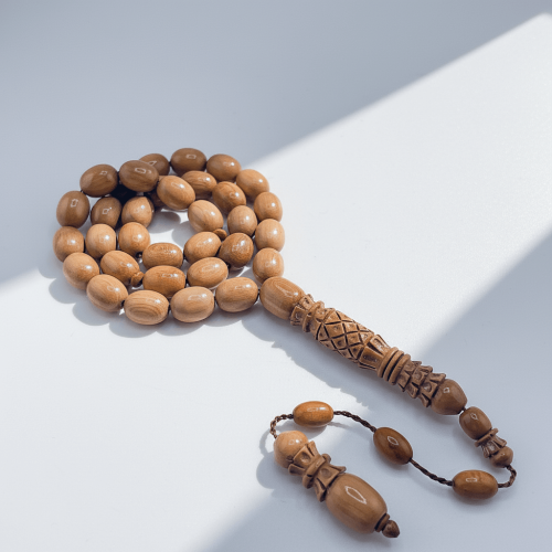 سبحة ناب الماموث المنقرض الشاهد منقوش