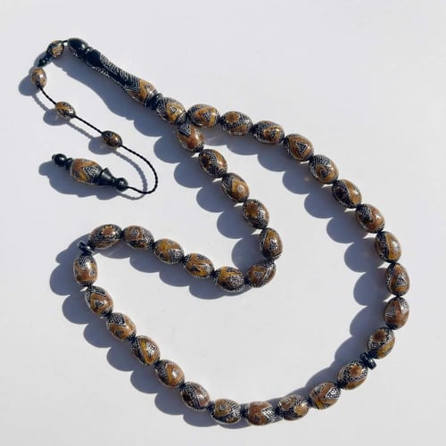 سبحة يسر مطعم كهرمان طبيعي و فضة عيار 1000 - 12 مل...