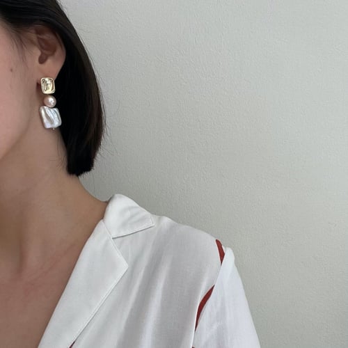 أقراط اللؤلؤ Vita