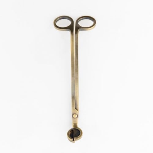 أداة قص فتيل الشمع