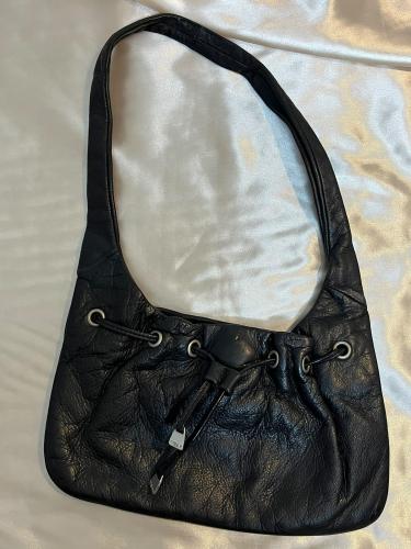 The Sak Black Leather Drawstring Shoulder Bag