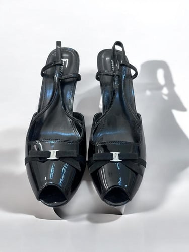 ferragamo black patrnt heels ( brand new)
