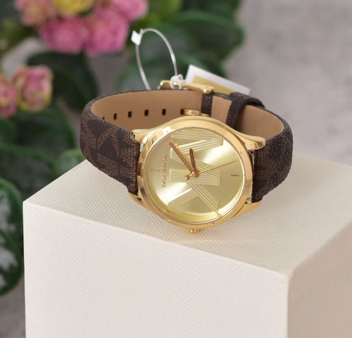 ساعة مايكل كورس