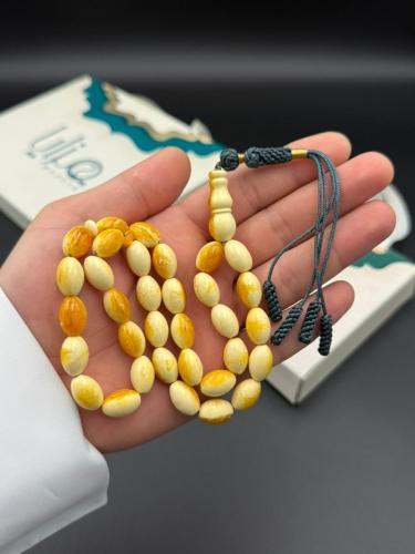 مسابح تراب الكهرمان شكة قماش