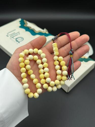 مسابح تراب الكهرمان شكة قماش