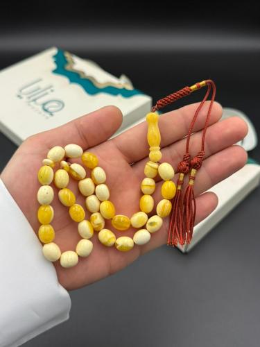 مسابح تراب الكهرمان شكة قماش