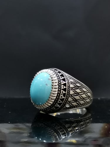 يخاتم الفضة بحجر فيروز نيشابوري ايراني بصياغة عباس...