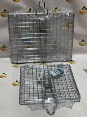 شبك شوي استيل مع يد قابلة للصفط وفصالات