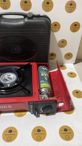 موقد رحلات سفري بشنطة يعمل على دبات الكبس ولي الغا...