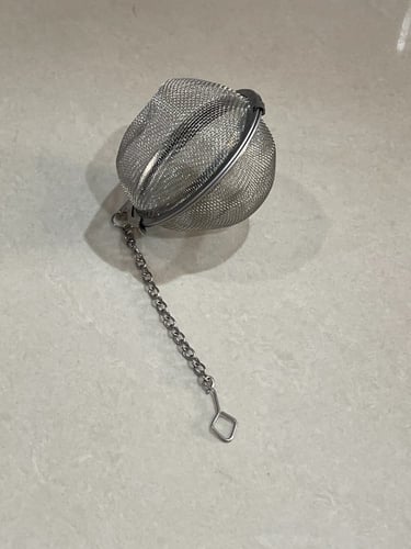 مصفاة وشخال المعاميل على شكل كورة مع سلسلة