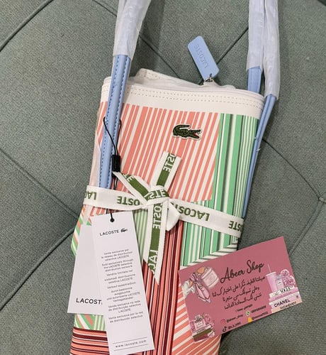 Lacoste bag ملونه