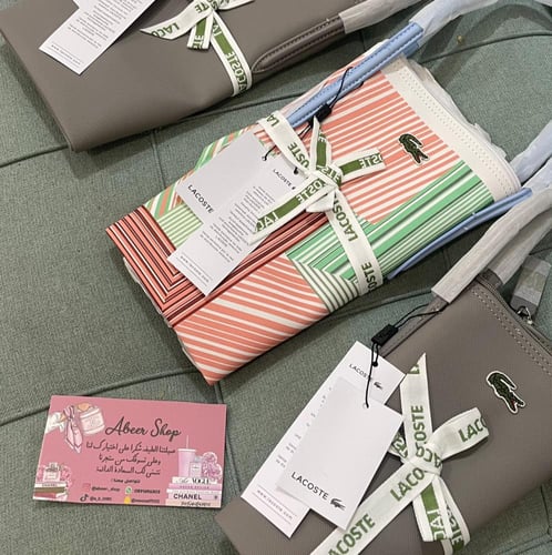 Lacoste bag ملونه