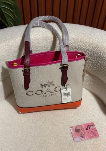 coach mollie tote ( كوتش مولي دانكن )