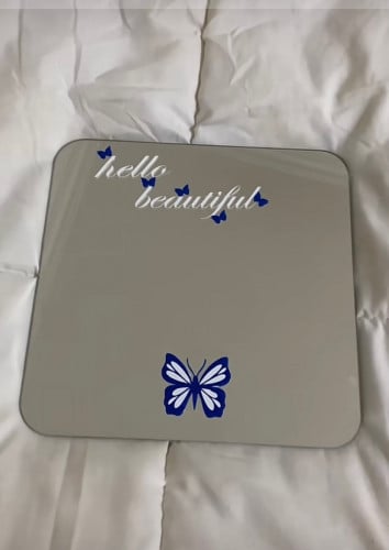 مرآة بملصق حجم(30*30)