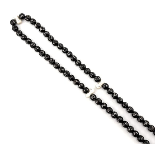 سبحة المرجان الاسود (اليسر) المطعمة بالعاج والفضة...