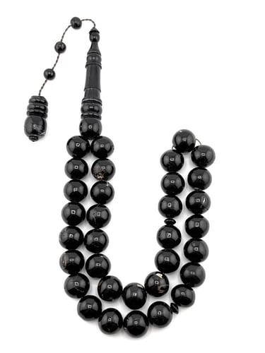 سبحة المرجان الأسود (اليسر) الطبيعي البلدي المضغوط