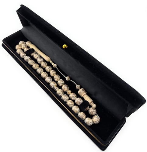 مسبحة مصنوعة من العاج الأصلي المطعم بالفضة النقية