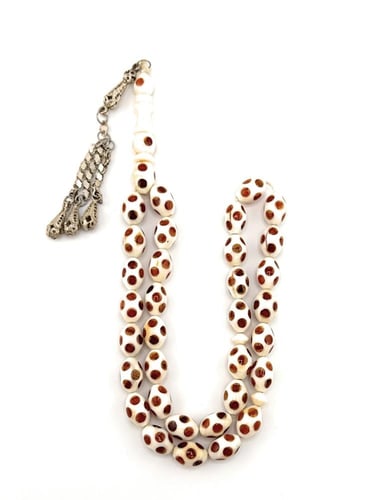 مسبحة العاج الأصلي المطعم بالكهرمان