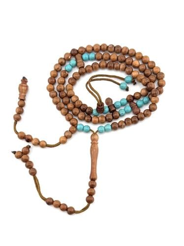 سبحة خشب جوز الكوك مطعمة بحبات من أحجار الفيروز ال...