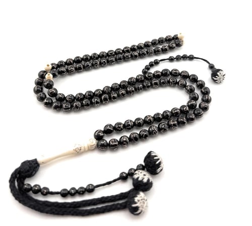 سبحة المرجان الاسود (اليسر) المطعمة بالعاج والفضة...