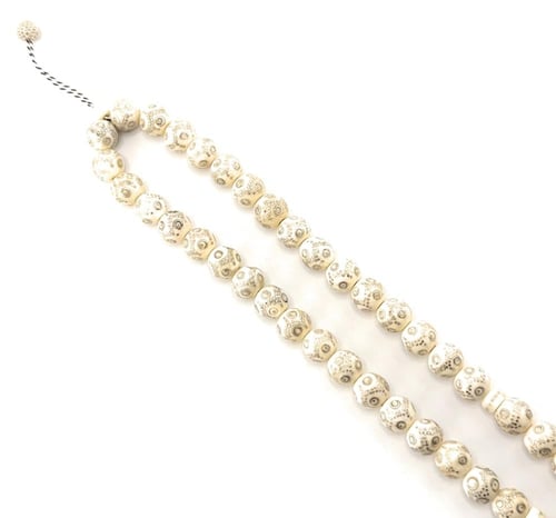 سبحة العاج المطعمة بالفضة