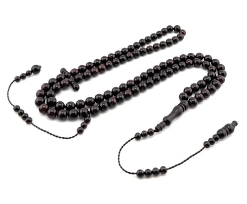 سبحة خشب جوز الكوك بلونها العودي الداكن المائل إلى...