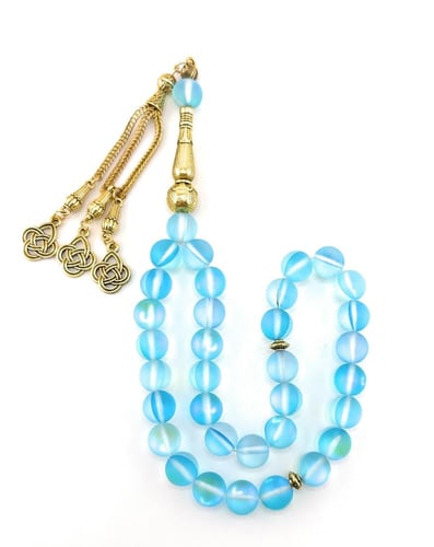 سبحة حجر الكريستال الازرق الفاتح