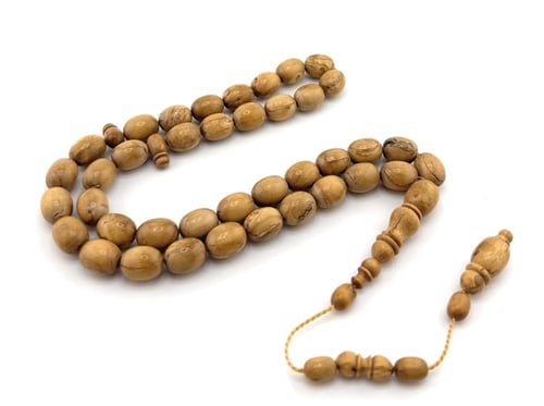 مسبحة مصنوعة من خام الماموث النادر الطبيعي 100%