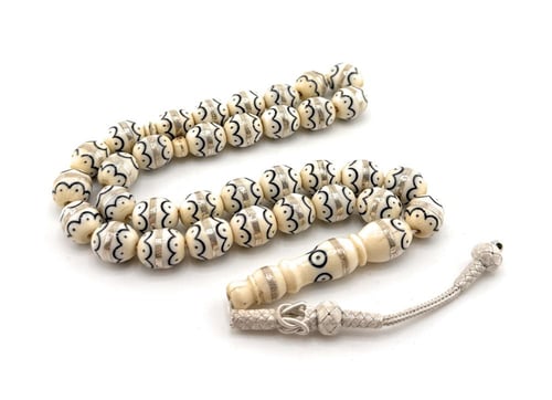 سبحة العاج المطعمة بالفضة