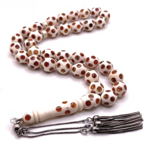 سبحة عاج مطعّم كهرمان