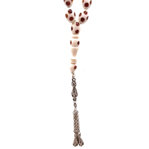 سبحة عاج مطعّم كهرمان