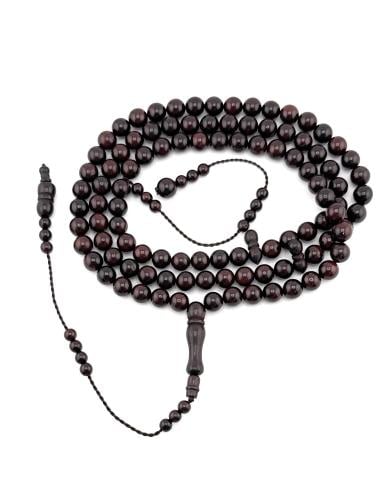 سبحة خشب جوز الكوك بلونها العودي الداكن المائل إلى...