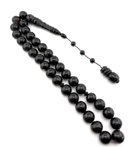 سبحة المرجان الأسود (اليسر) الطبيعي البلدي المضغوط