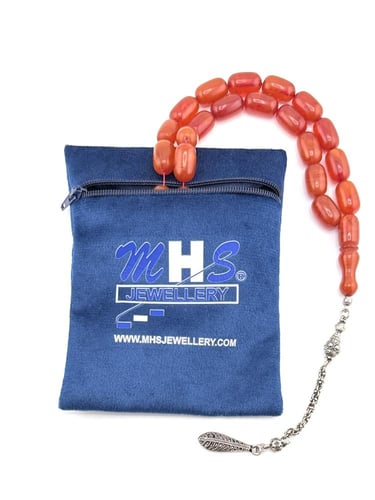 سبحة مسك الغزال ( لون أحمر مائل إلى البرتقالي )