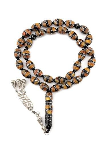 سبحة المرجان الاسود (اليسر) المطعمة بالكهرمان والف...