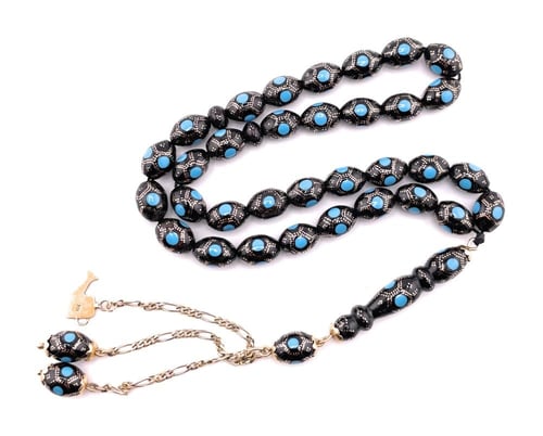 سبحة المرجان الأسود بالذهب عيار 18 مزينة بأحجار ال...